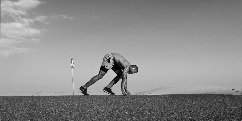 Man Running on Asphalt